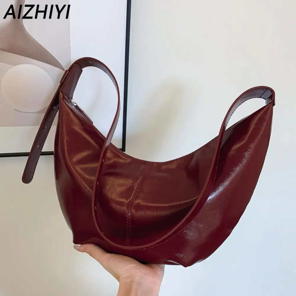 Ava Luxe Hobo Handtas